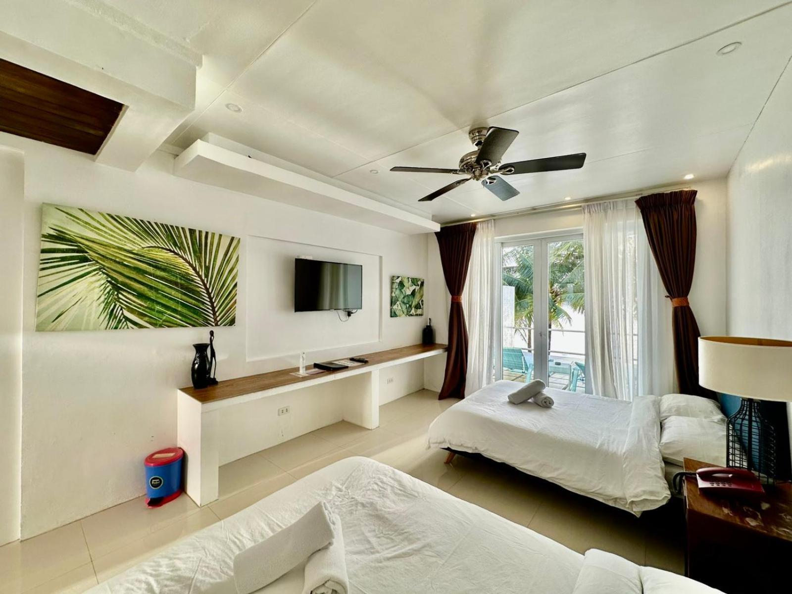 Calypso Beach And Dive Resort Manoc-Manoc Exterior photo